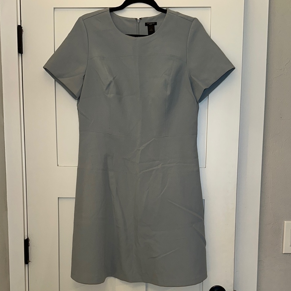 Gray knee-length sheath dress with short sleeves and crew neck for work